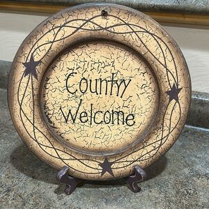 Country sign with stand. Approx 10” x 10”. Smoke free home.